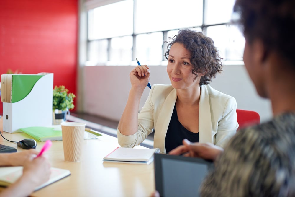 Unposed group of creative business people in an open concept office brainstorming their next project.-Jun-14-2023-11-59-40-9220-AM