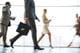 business people walking in a hurry symbolising the different leave types in the workplace