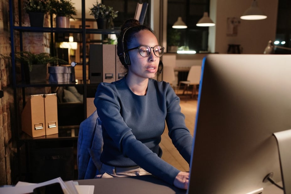 female call center operator working the night shift